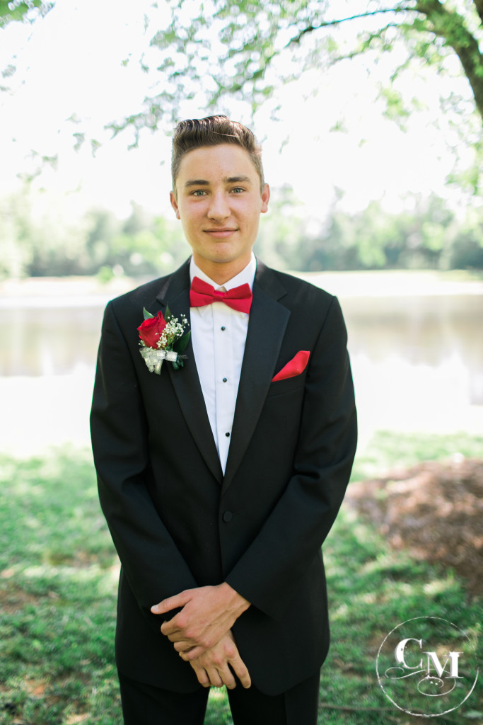 Prom night handsome boy with red bow tie