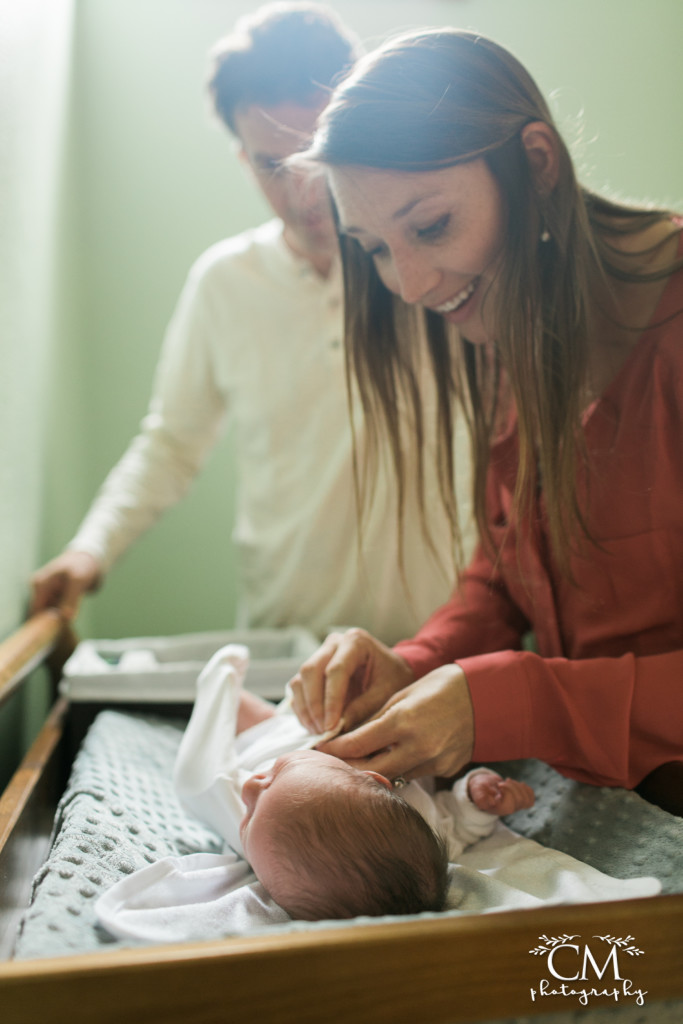 new mom changing diaper