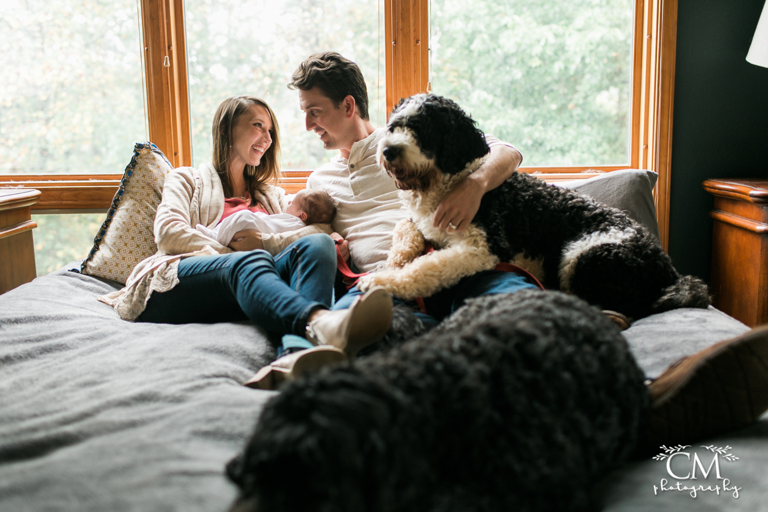 happy fur parents with newborn baby