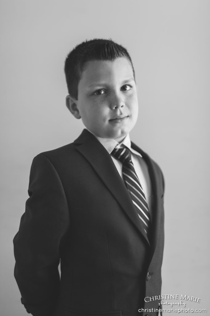 handsome boy in first holy communion portrait 