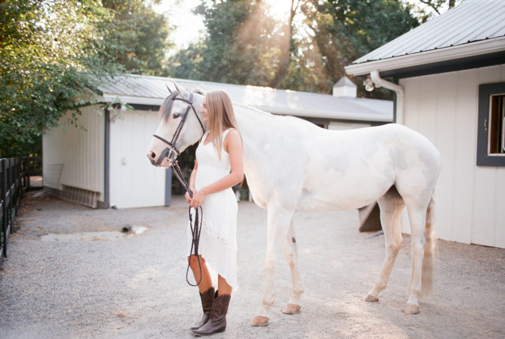 teenage girl with white horse