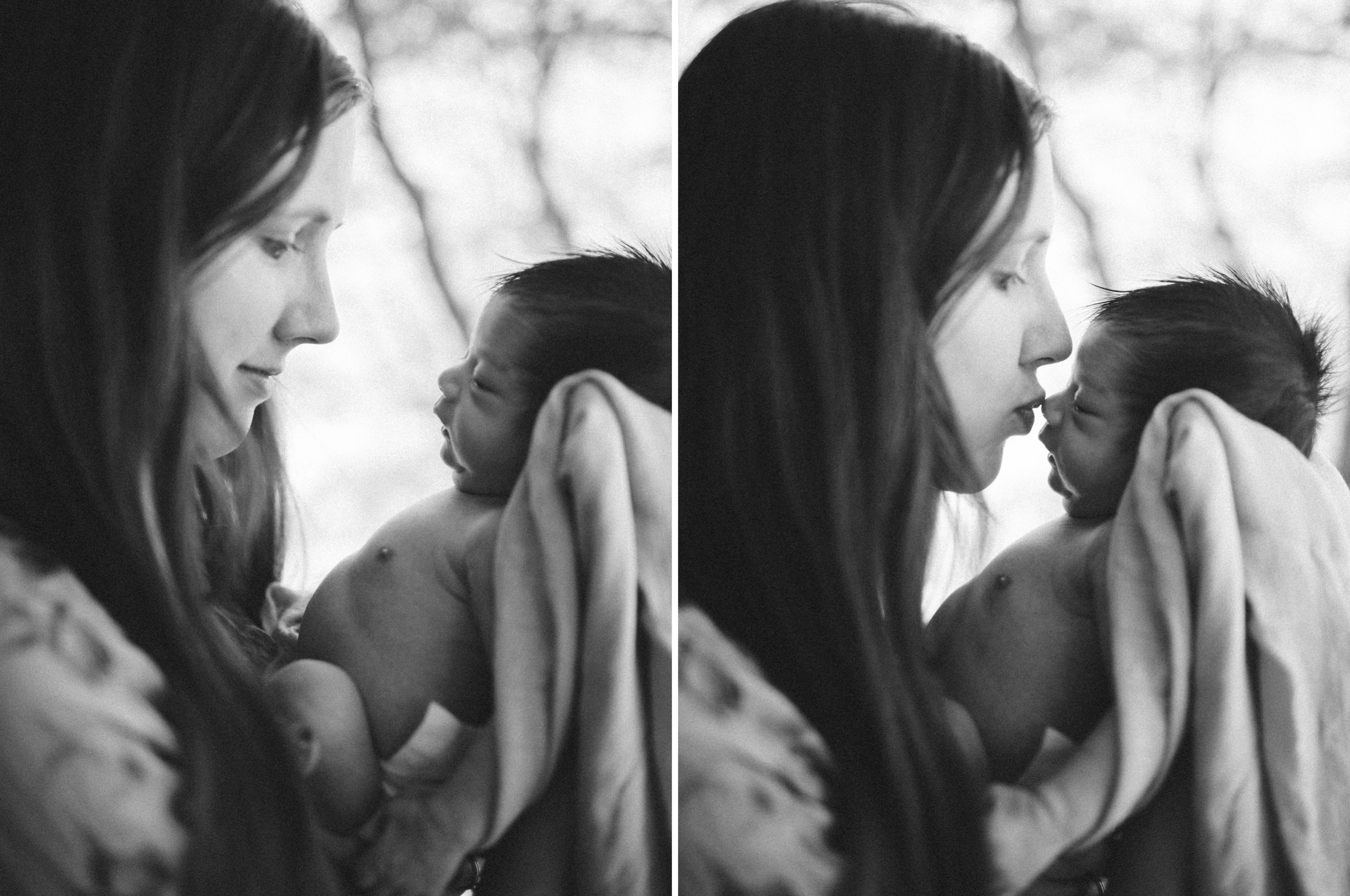 mom kissing baby's nose