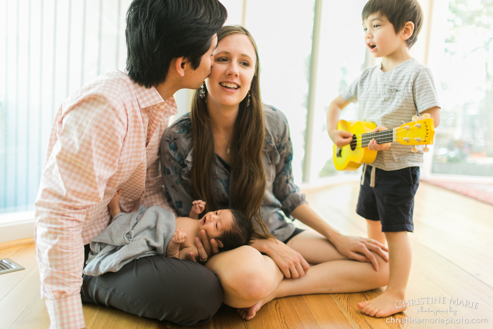 sweet family of four with two boys