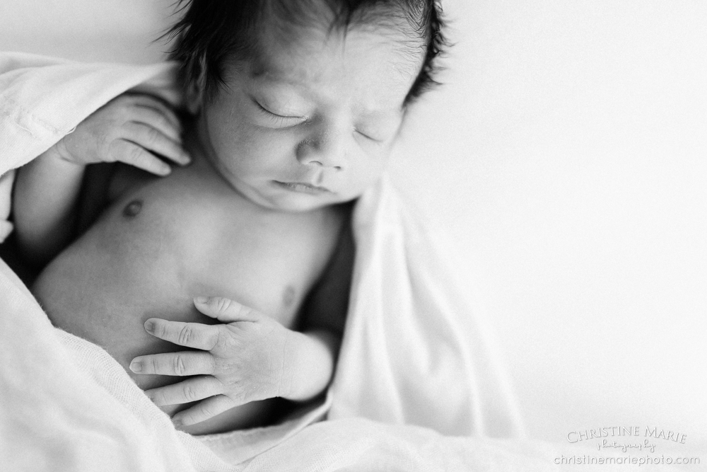 sleeping newborn baby hands