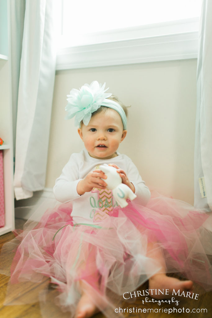 little girl with big flower headband and tutu