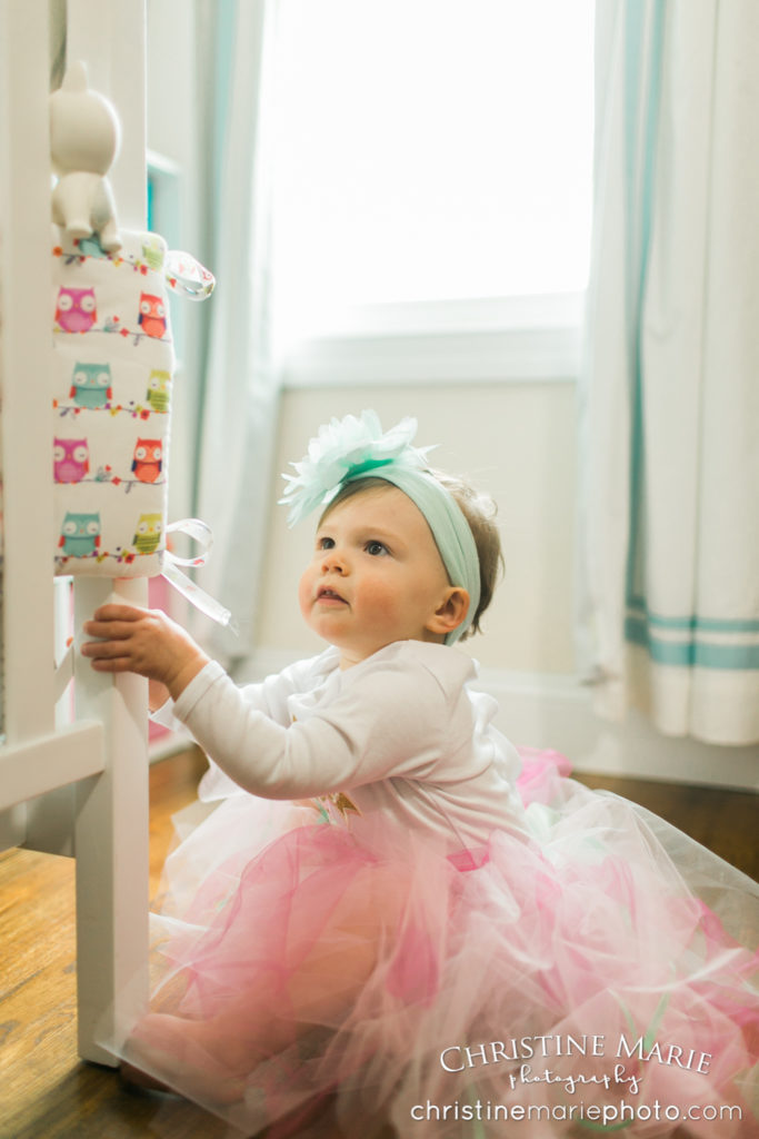 baby girl with tutu in nursery