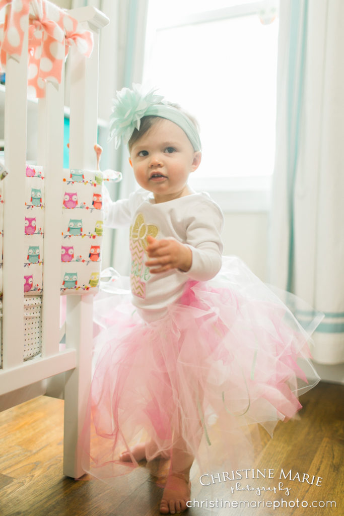 one year old baby girl in tutu
