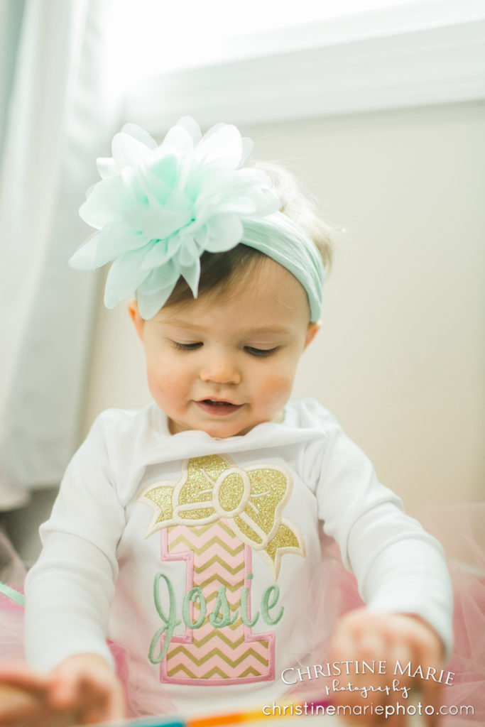 baby girl with big light blue flower headband 