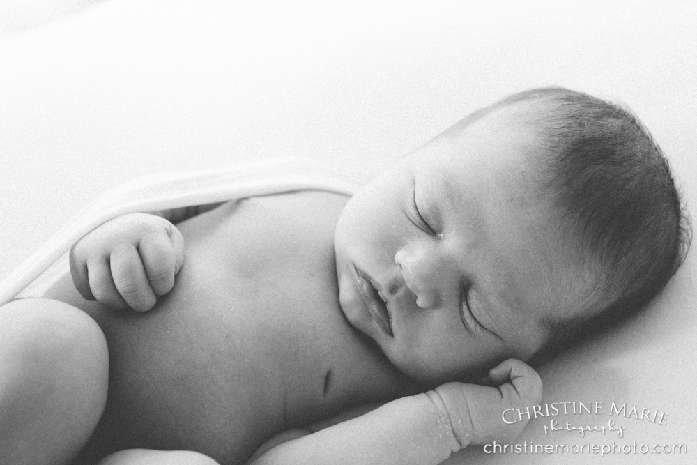 sleeping newborn baby black and white 