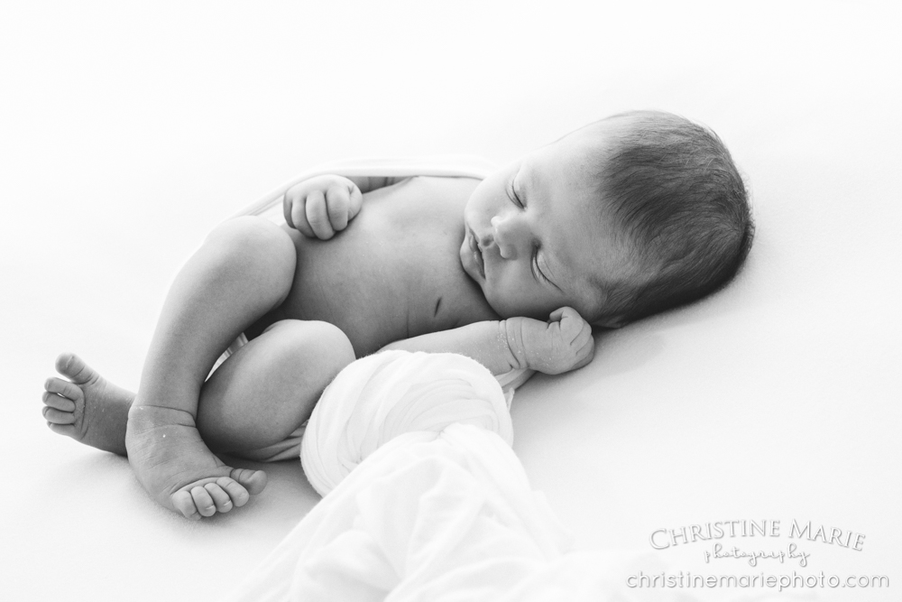 black and white sleeping baby girl