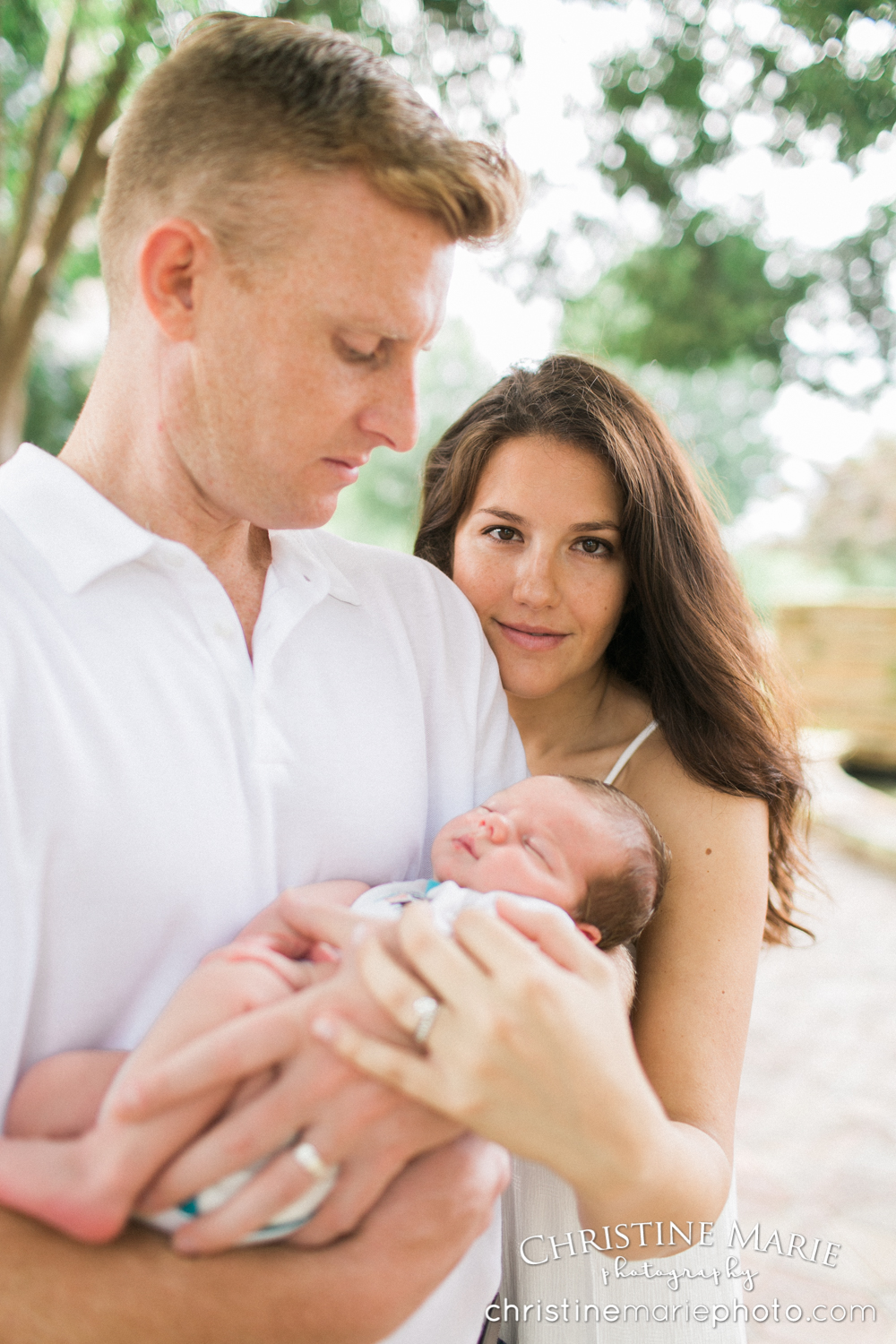 new mom with husband and baby