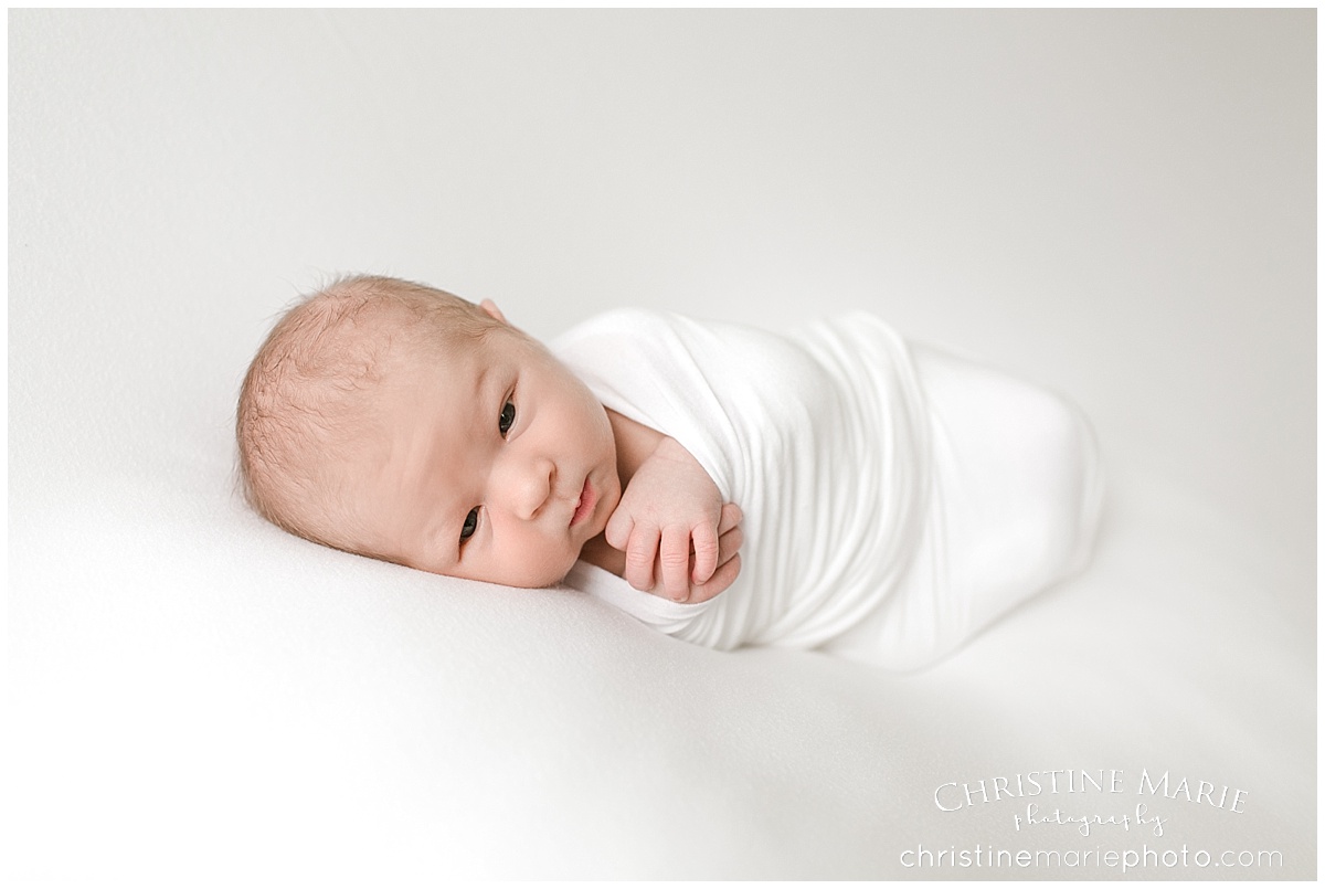 wrapped up awake newborn photo