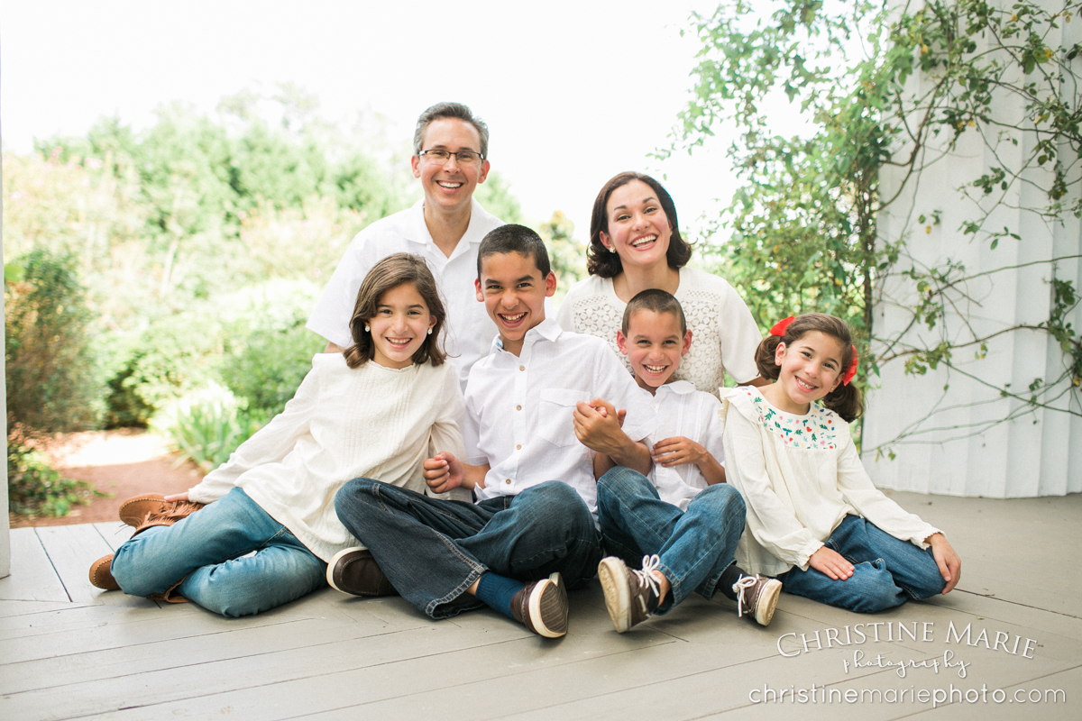 happy large family on front porch of barrington hall