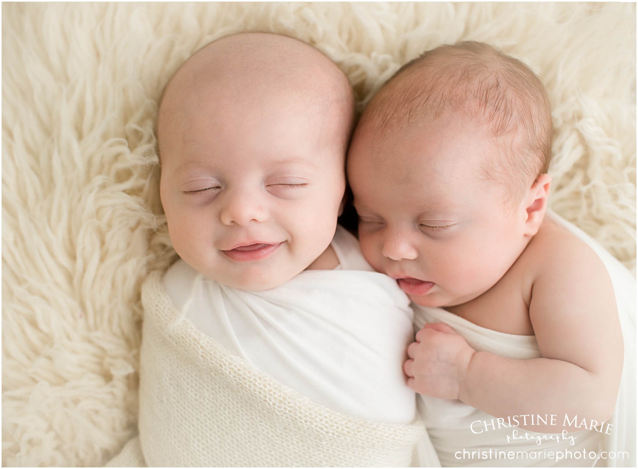 happy newborn twins smiling - christine marie photography