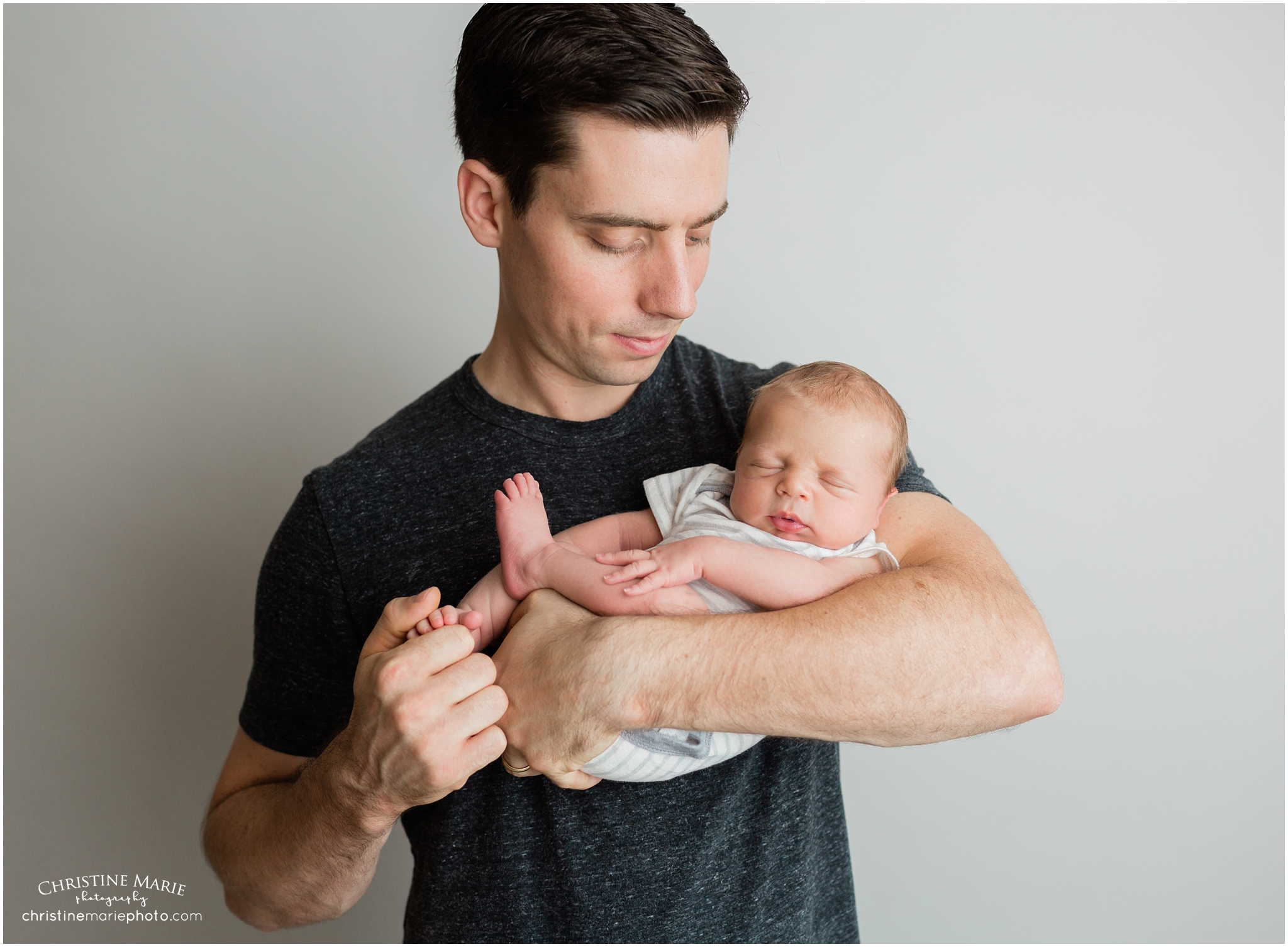 father and son, cumming newborn photographer 