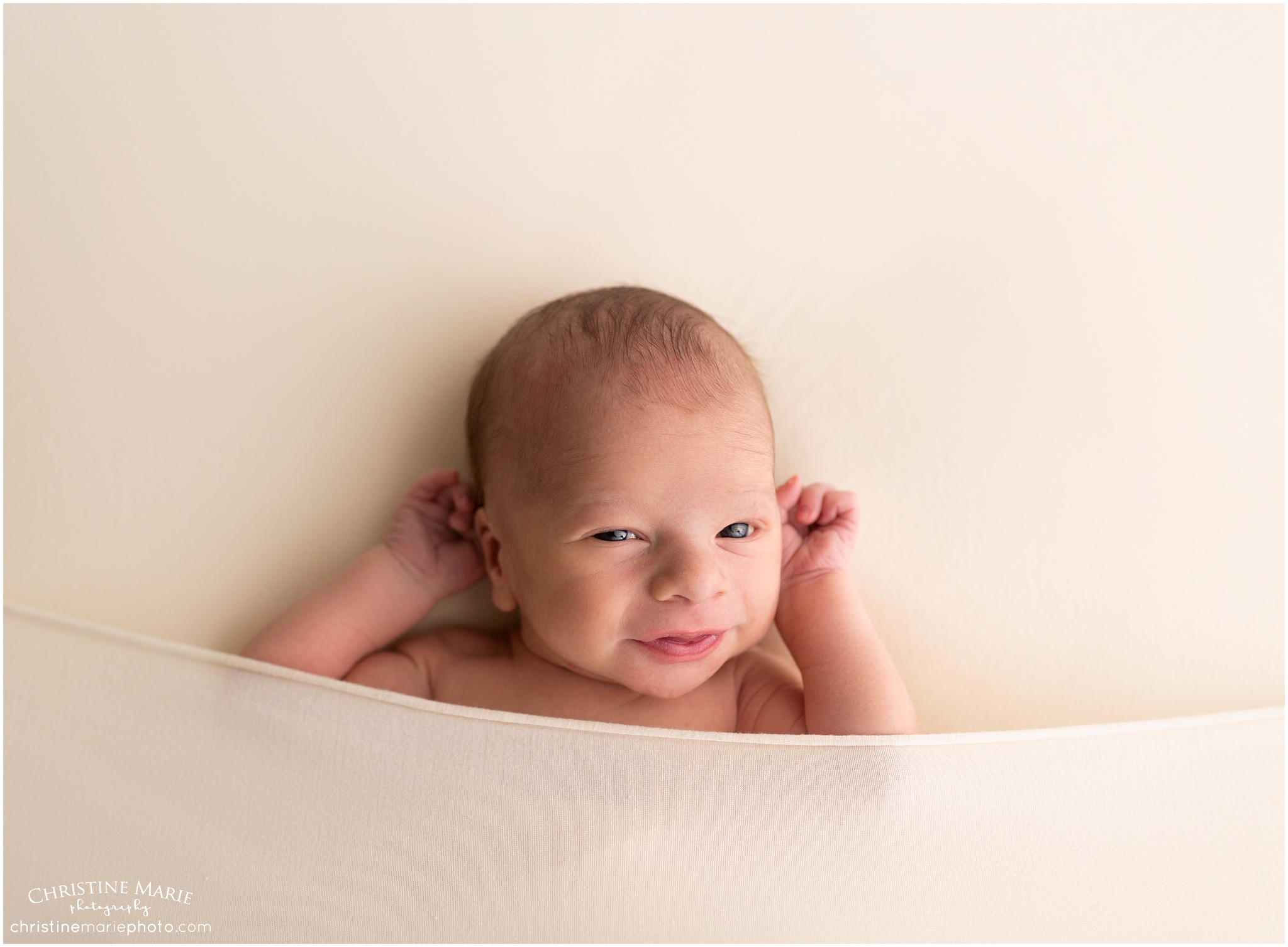 tucked in baby, cumming newborn photographer 