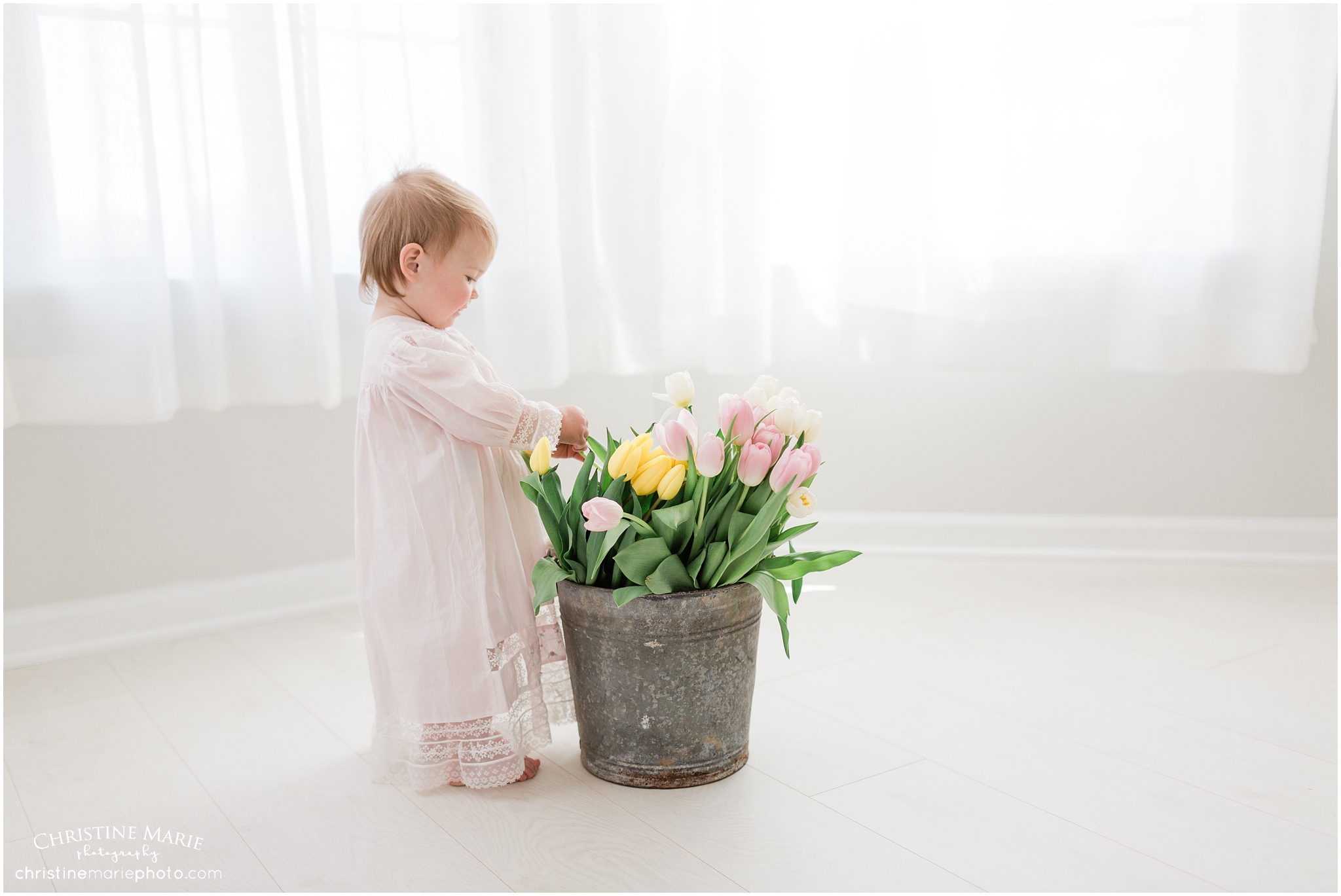 cumming baby photographer, little girl in vintage nightgown and tulips