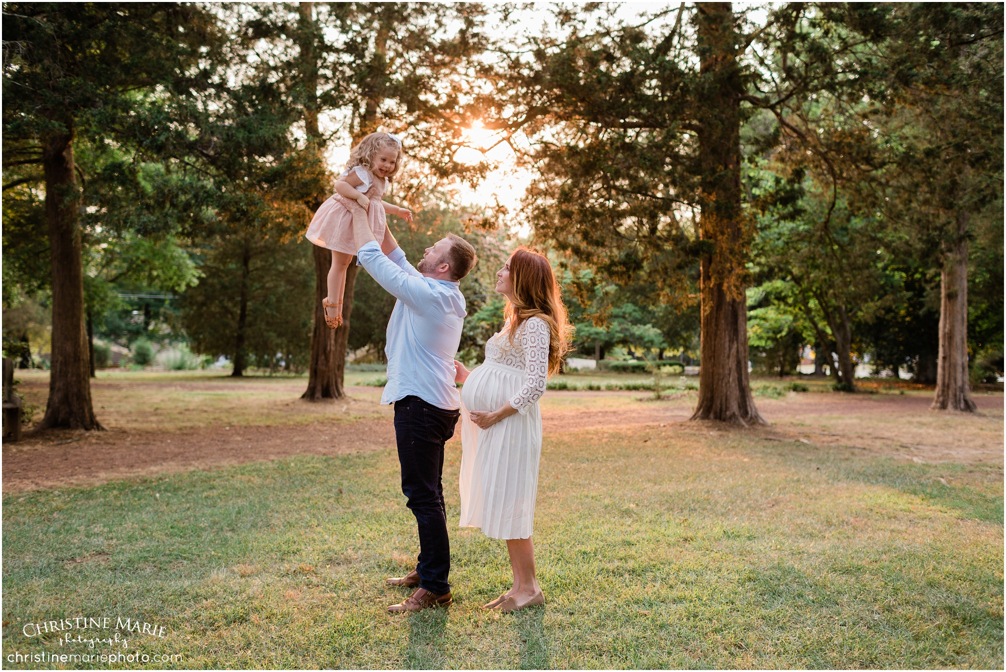 dad throwing toddler girl, cumming family photographer