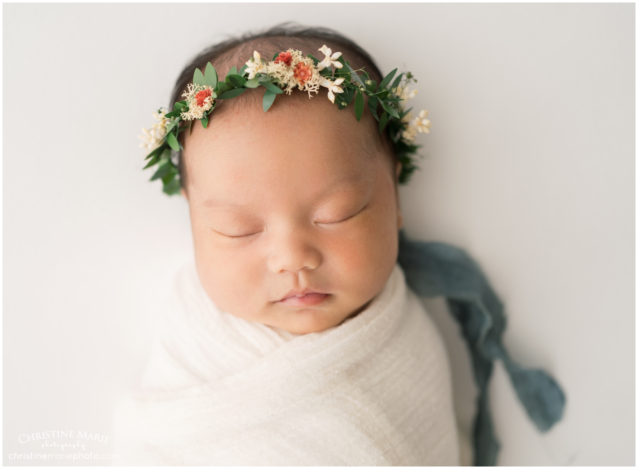 baby girl with floral headband