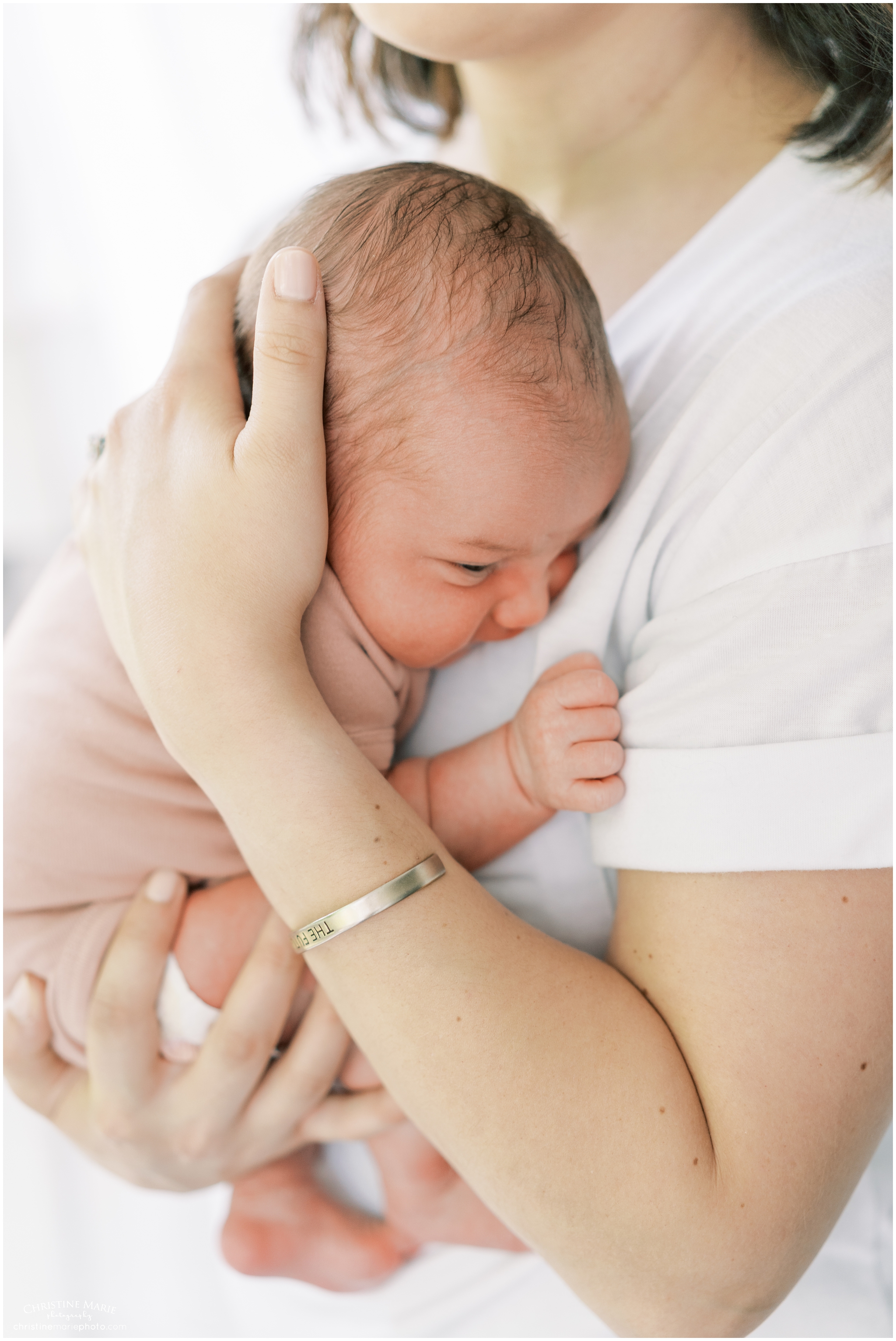 squished up newborn baby girl in atlanta lifestyle newborn photo session