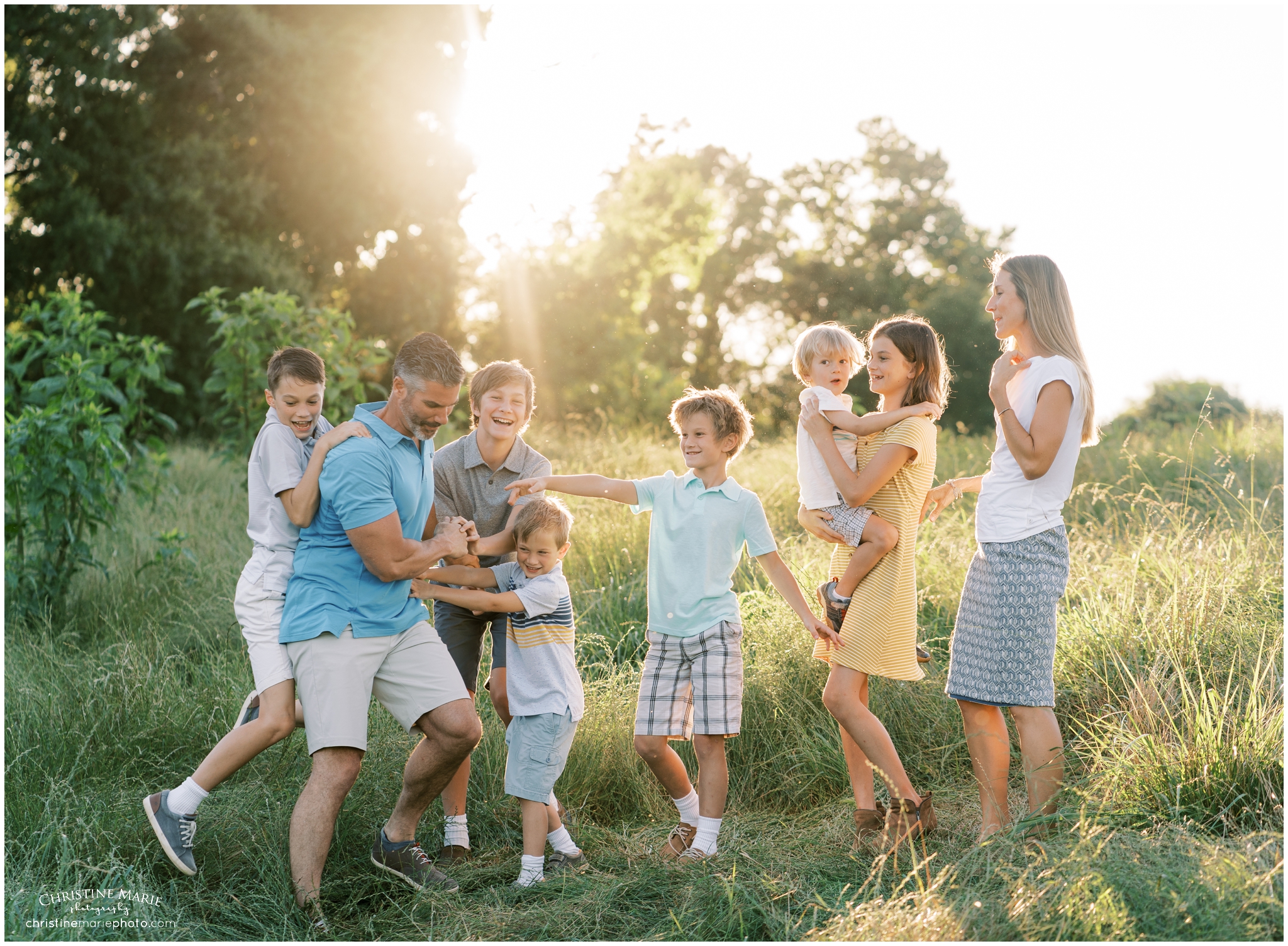 playful large family photo at sunset in cumming ga