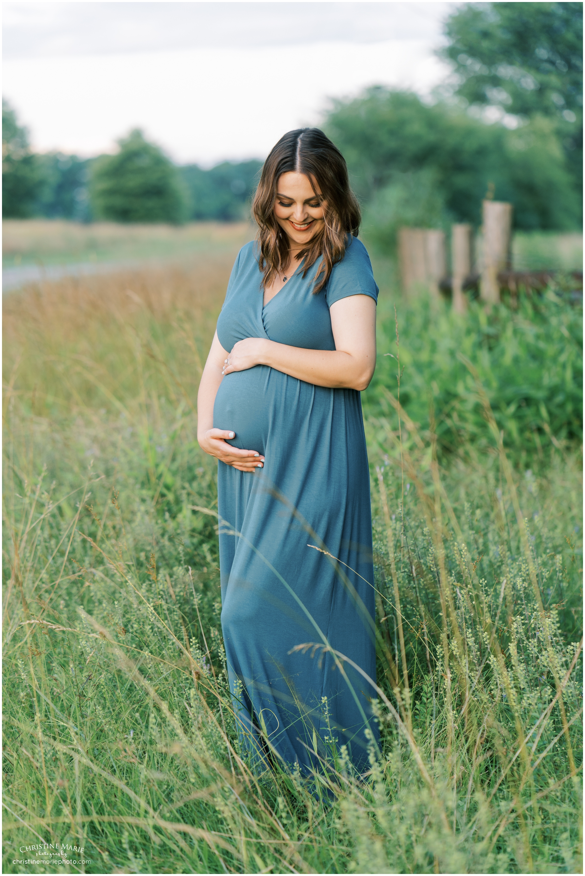 beautiful maternity photo in a field in cumming, ga 