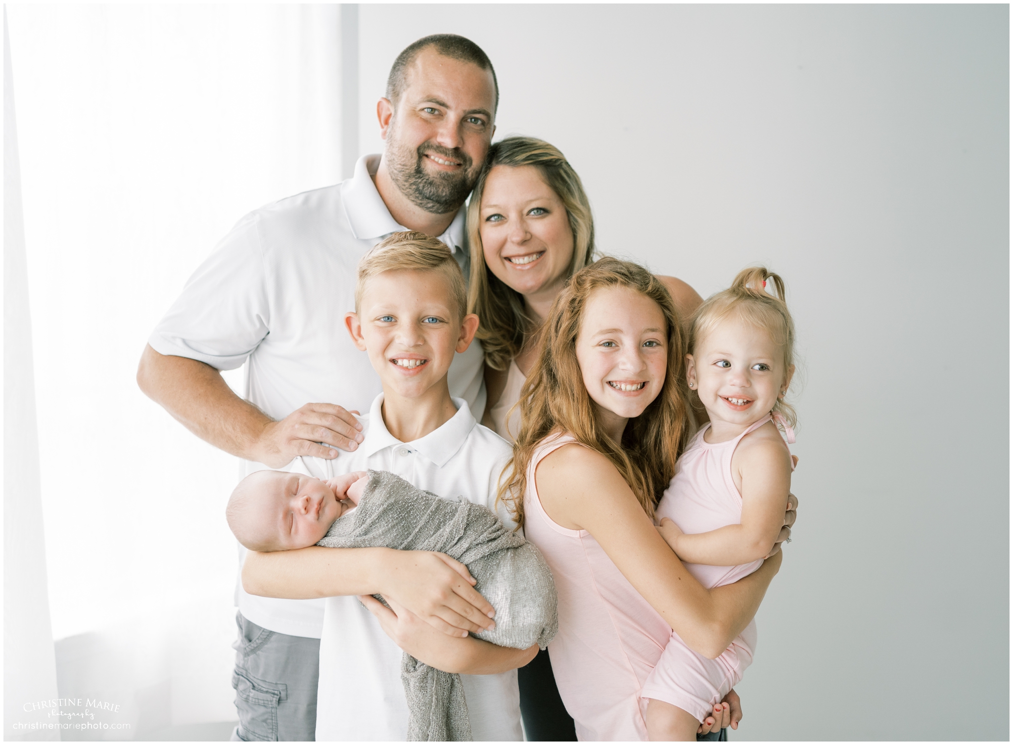 family photo with newborn baby in Cumming GA