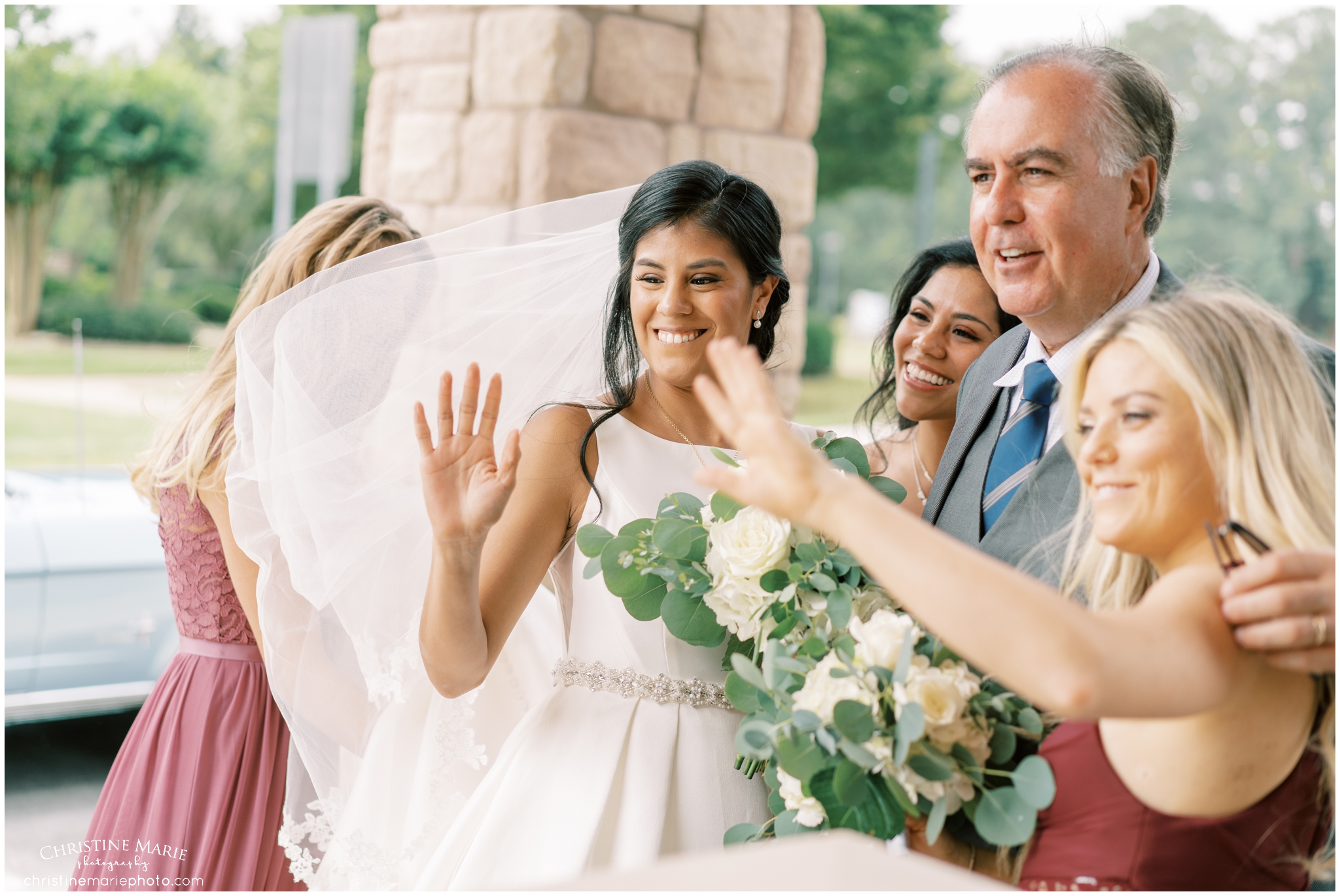 bride arrives at st brendans catholic church