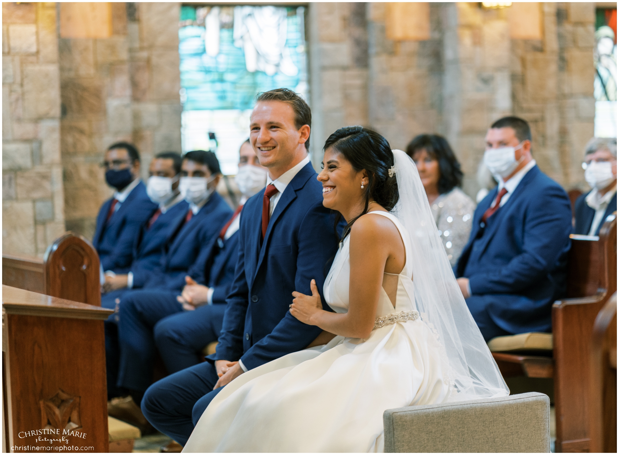 bride and groom laughing during ceremony