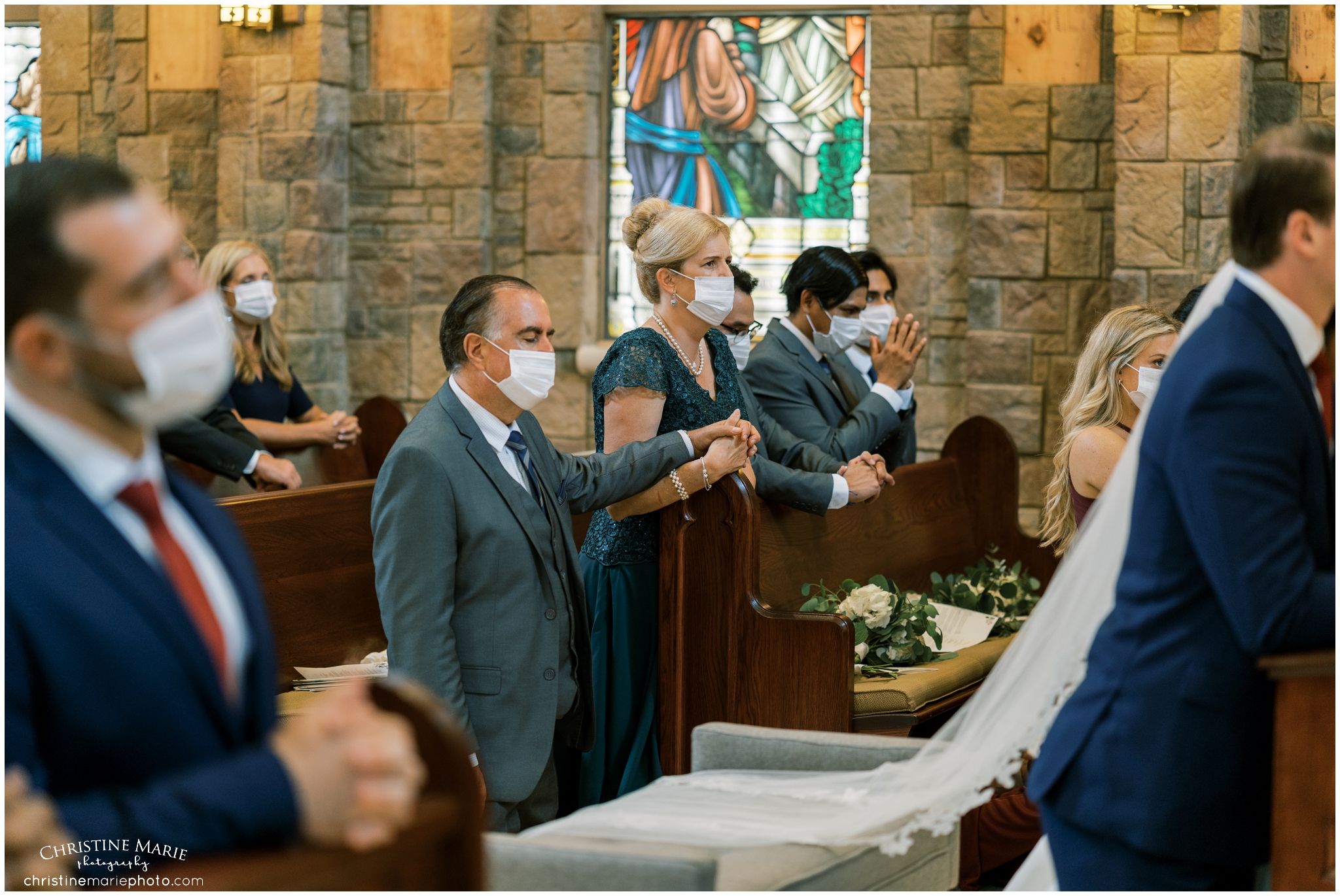 people praying at wedding ceremony in cumming ga