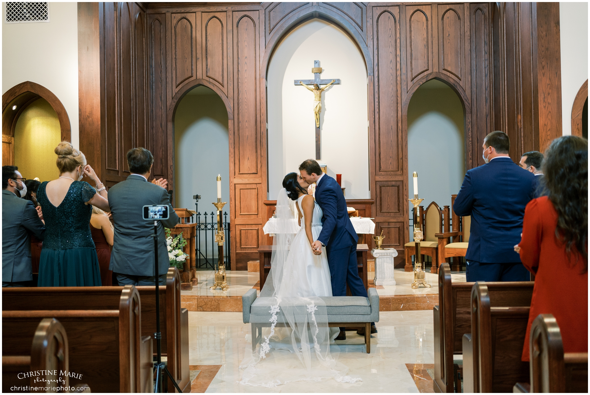 bride and groom kissing, cumming ga wedding