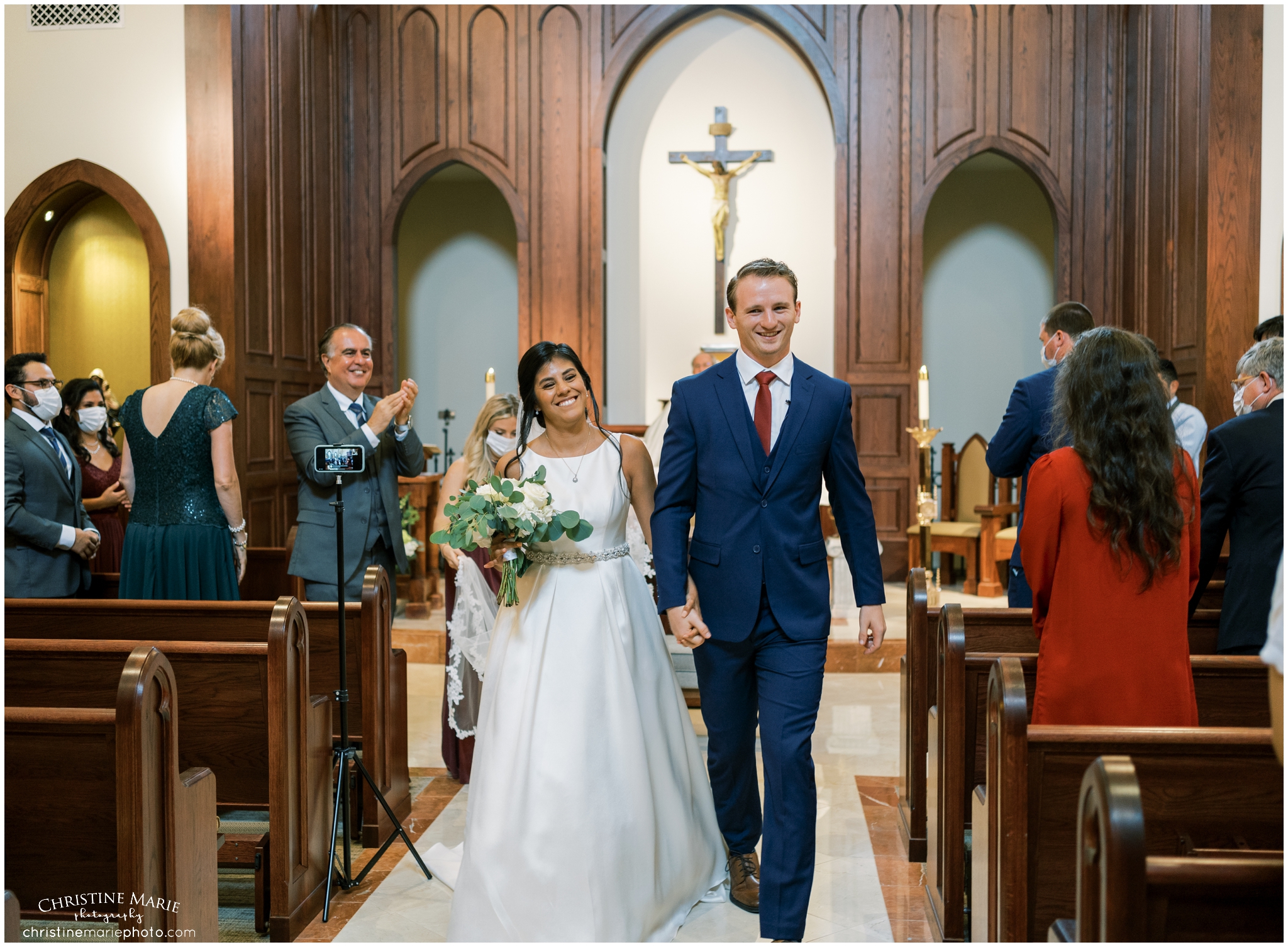 Bride and groom just married at St. Brendans Catholic Church