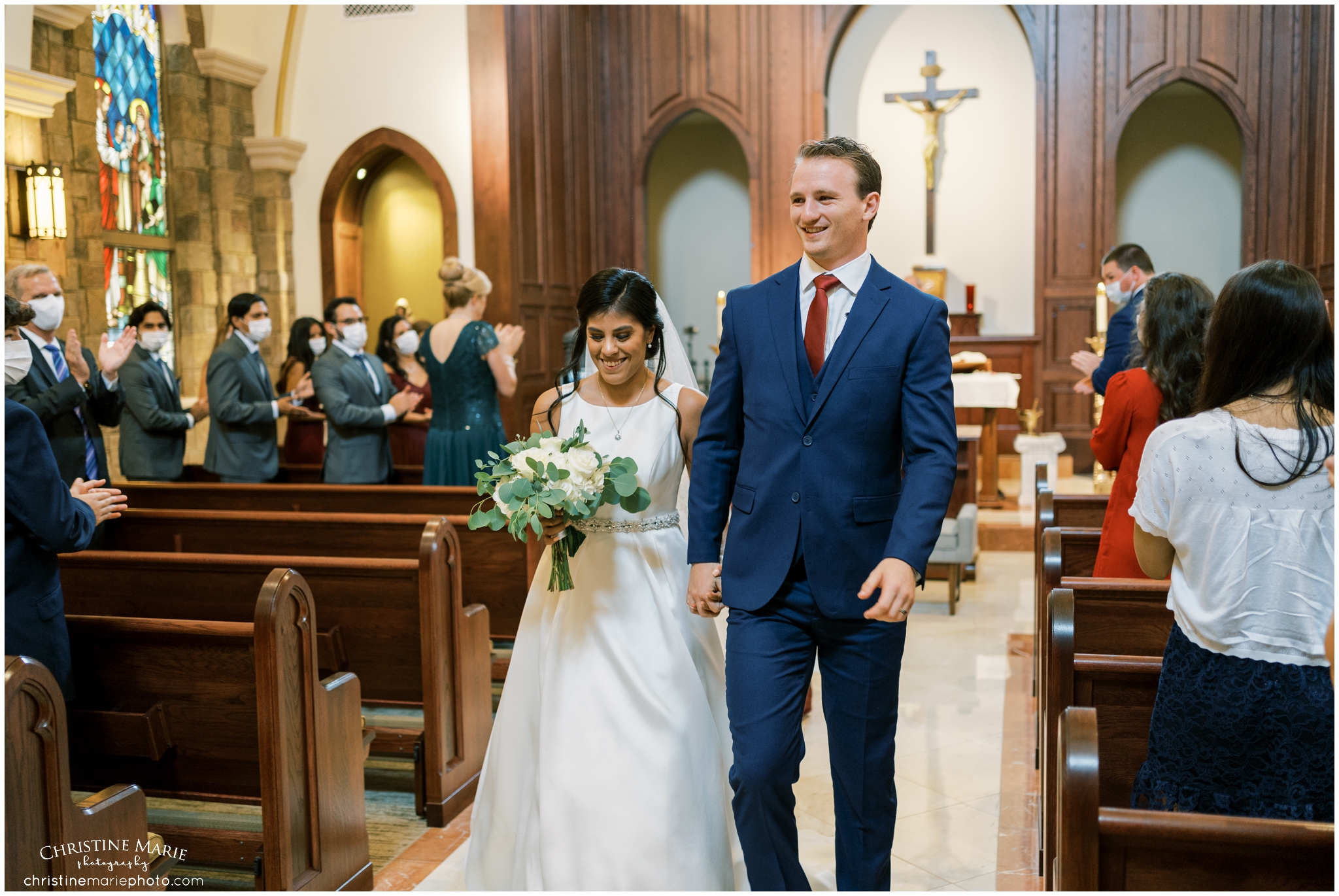 Bride and groom just married at St. Brendans Catholic Churc