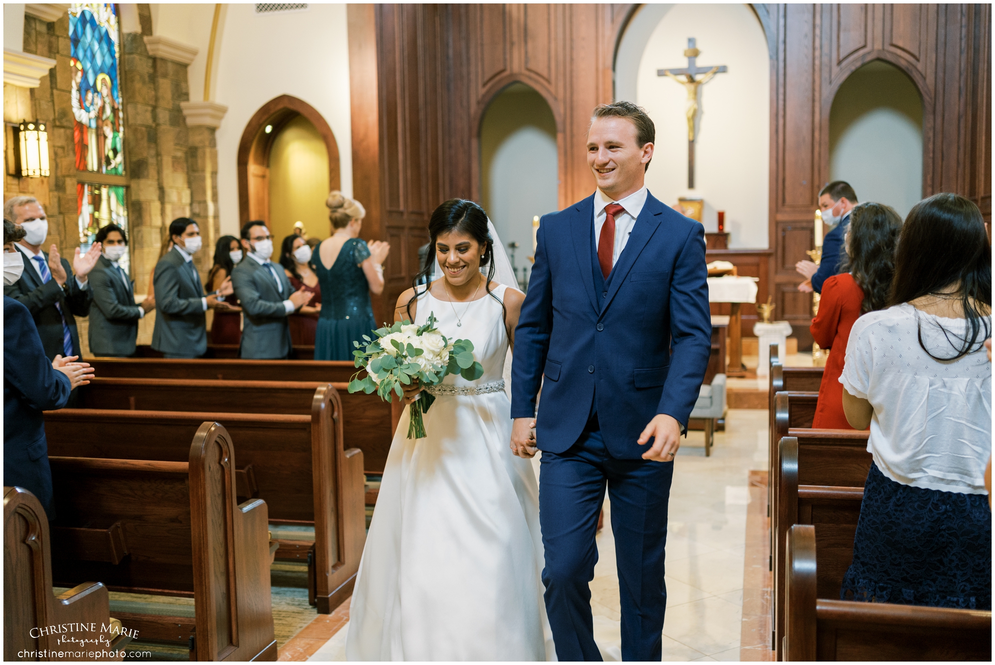 Bride and groom just married at St. Brendans Catholic Churc