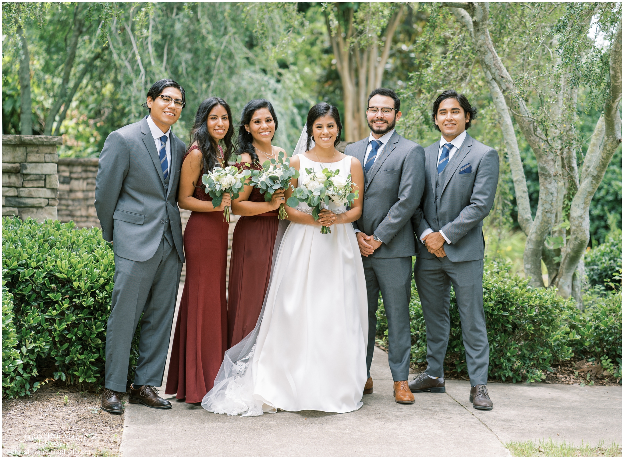 wedding party photos at St. Brendans Catholic Church in Cumming