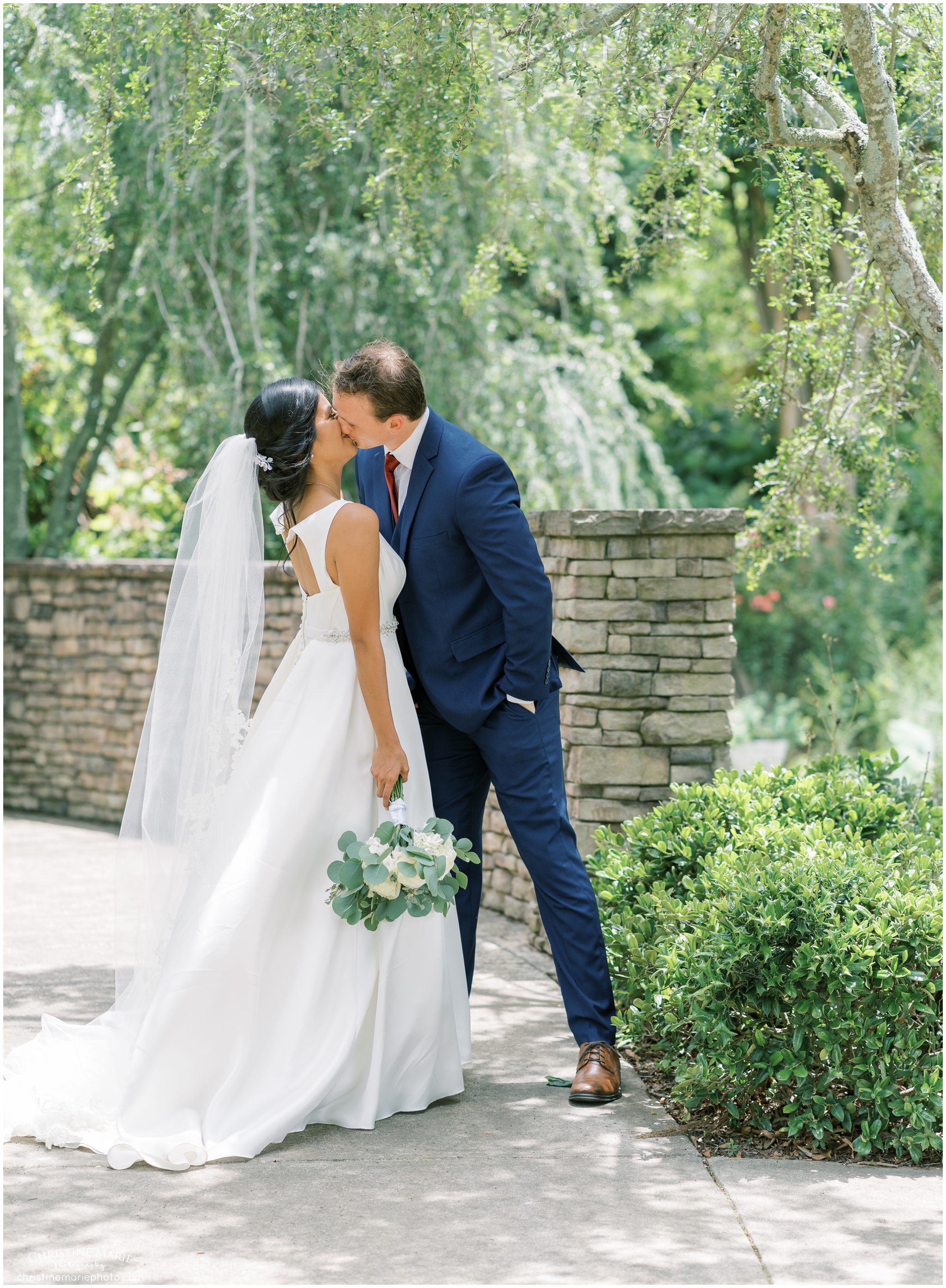 bride and groom photos at St. Brendans Catholic Church in Cumming