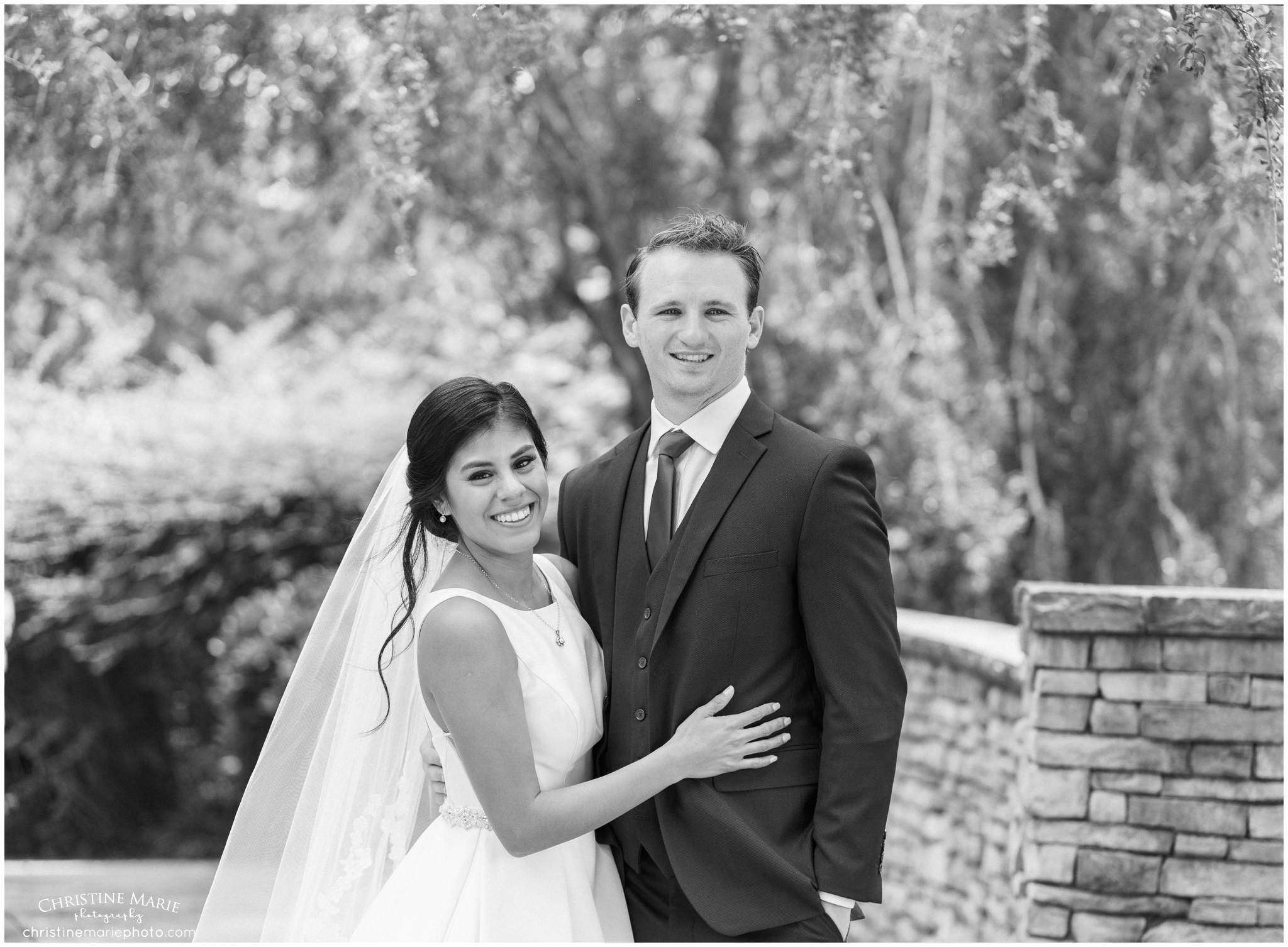 bride and groom photos at St. Brendans Catholic Church in Cumming