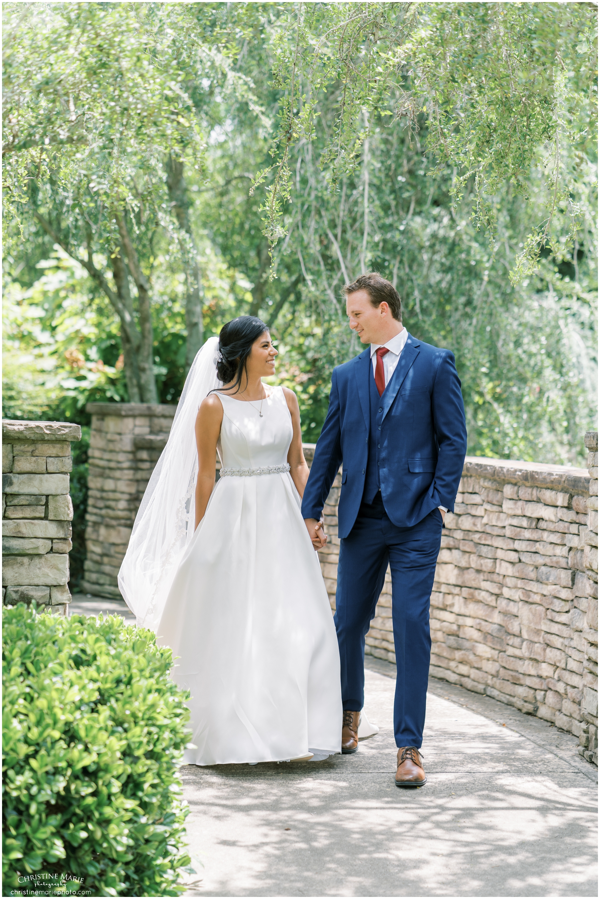 bride and groom photos at St. Brendans Catholic Church in Cumming