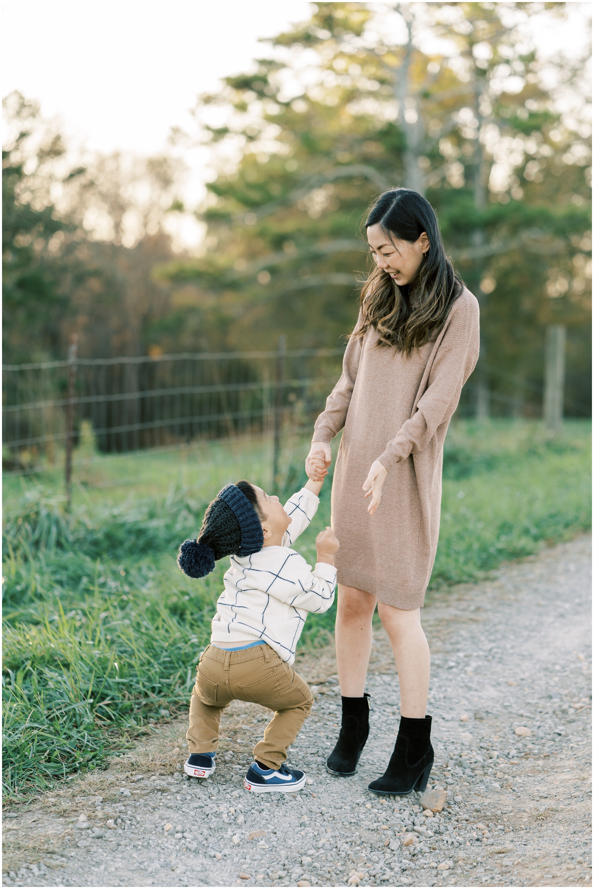 mother and son playing during family photoshoot