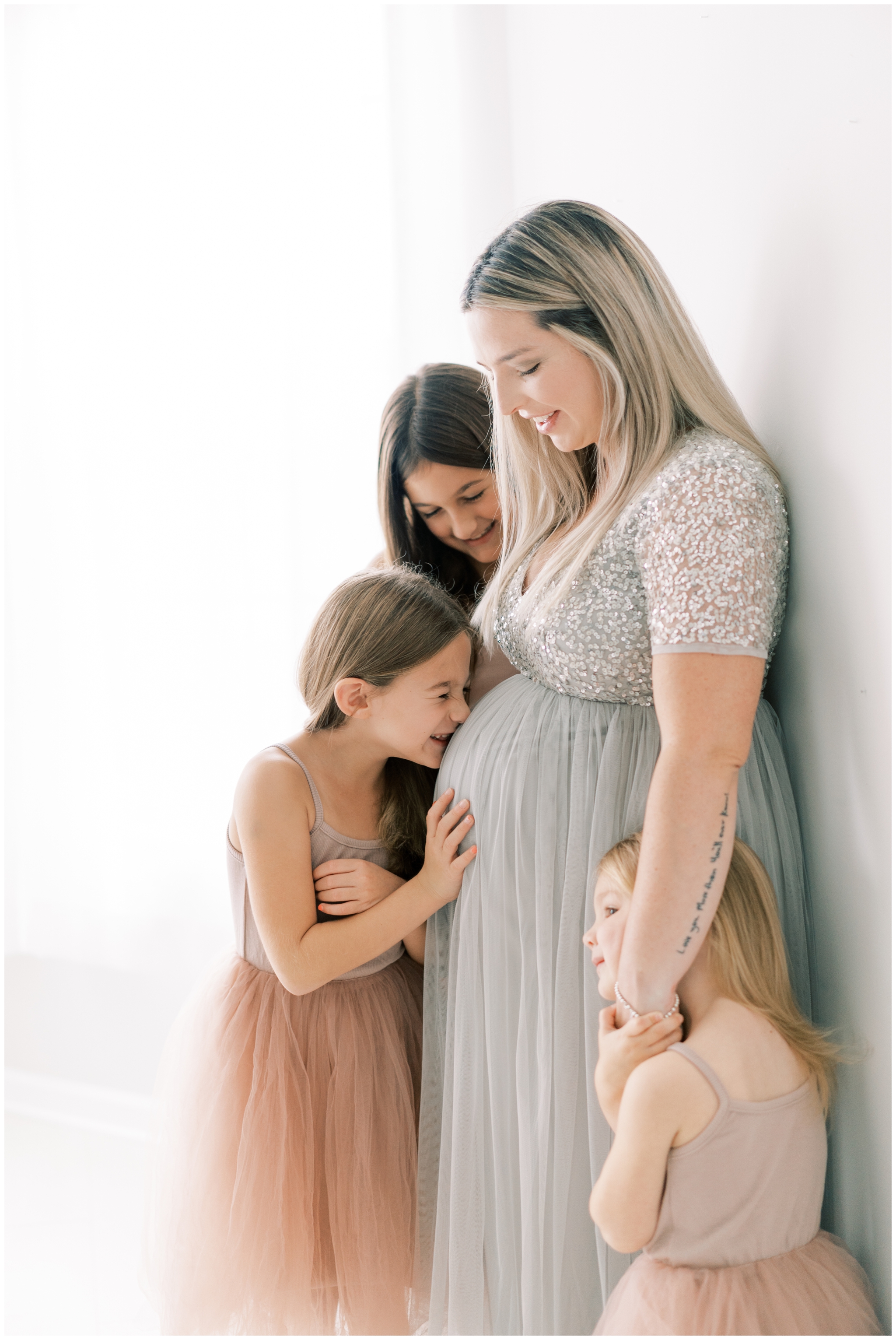 natural studio maternity photos with family