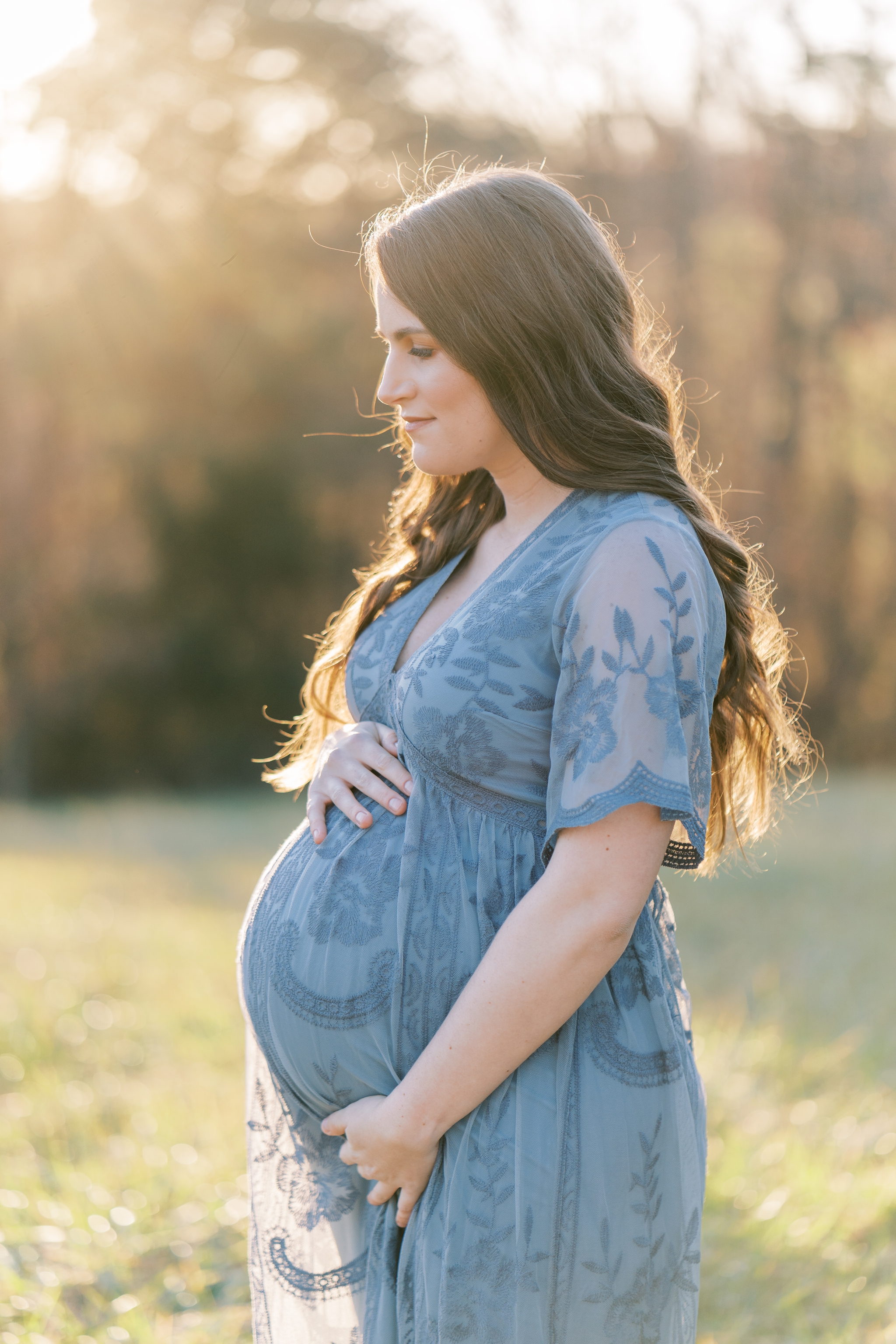 golden backlit maternity photo in north ga