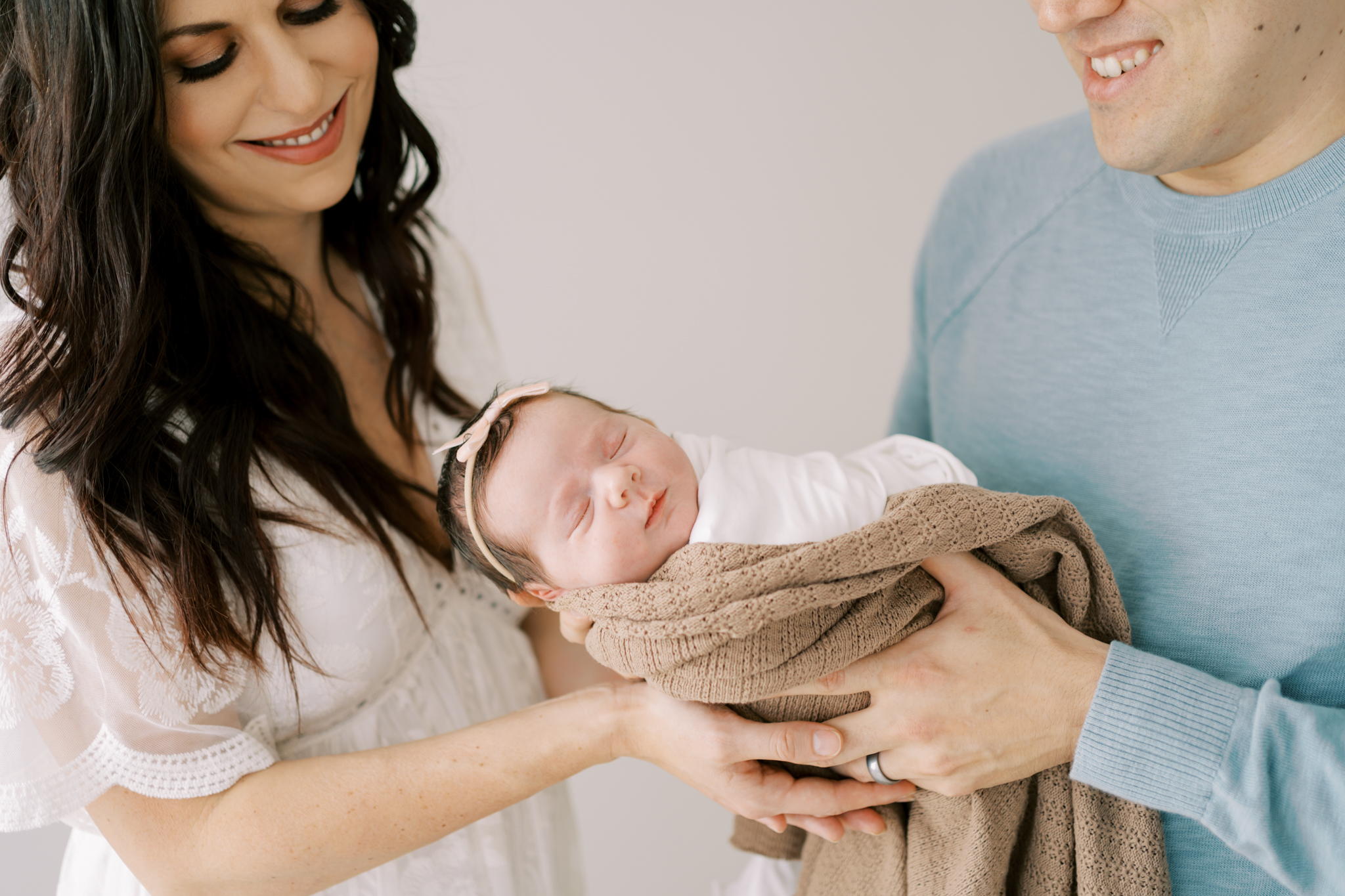 parents holding new baby, atlanta newborn photographer