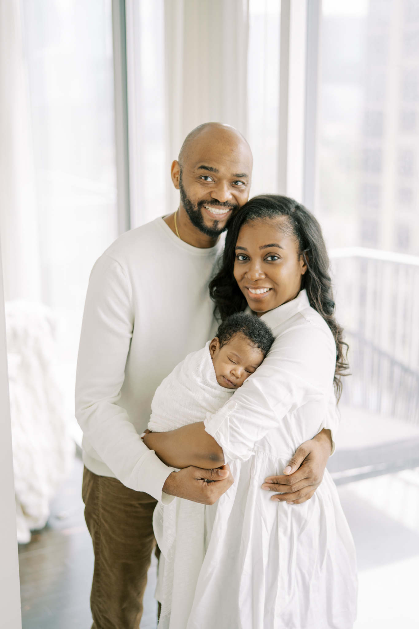 family with newborn in high rise condo Atlanta GA
