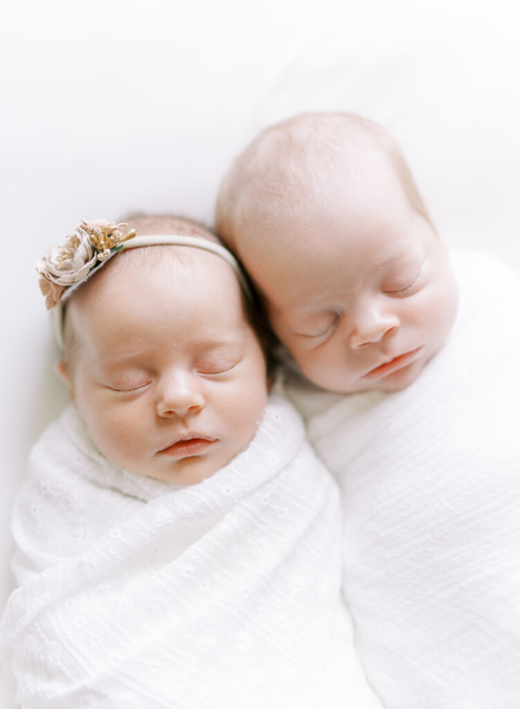 Clean and natural twin newborn photos in Cumming, GA